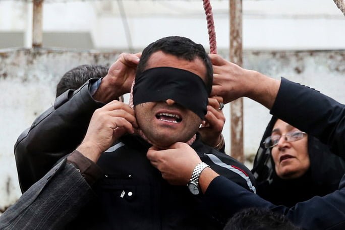 Four men are hanged in Iran for gang-raping mountain climber in front of her husband