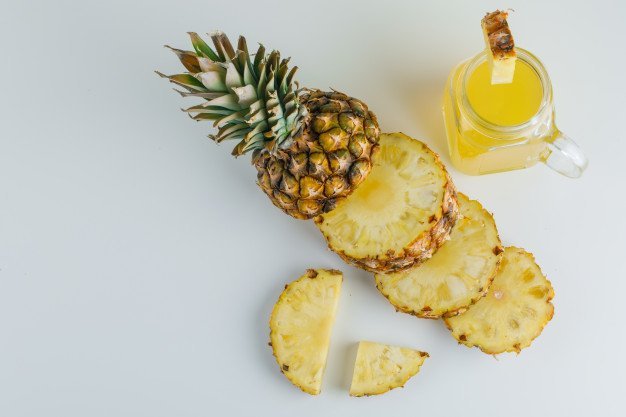 sliced pineapple with juice - Photo by 8photo