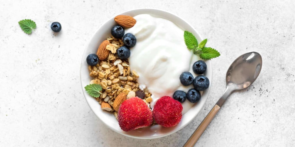bbigstock granola with yogurt and berrie 297815161