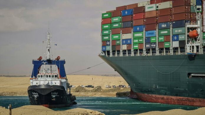 Effort to refloat wedged container ship Ever Given continues