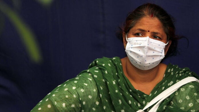 Are you still protected if you have not had any adverse effects following a COVID-19 vaccine? Photo by Mayank Makhija/NurPhoto via Getty Images.