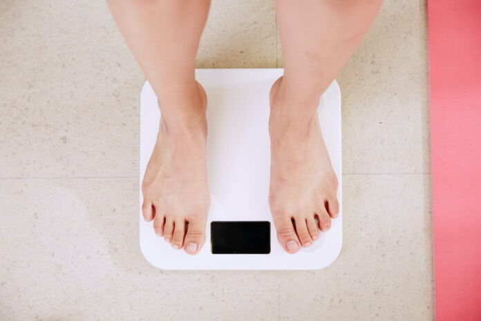 Every person has a healthy weight goal that they should aim for - Photo by I Yunmai