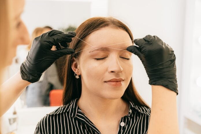 Eyebrow threading